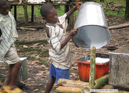 Child working at Liberian rubber plantation - International Labor Rights Fund