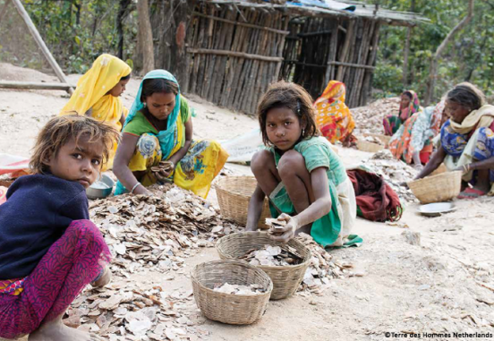 Children sorting mica chips in Indian mine - Terre des hommes